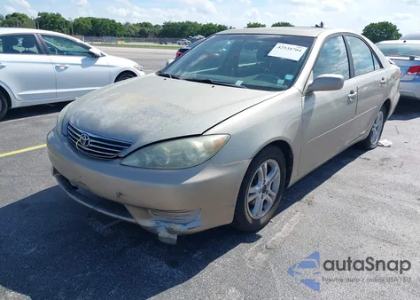 2005 Toyota Camry Le z USA, uszkodzony, nr VIN 4T1BE30K65U052726